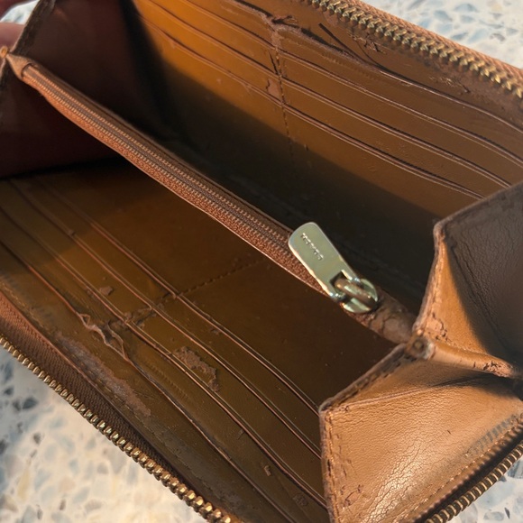 Coach Tan and Brown Signature Zip Wallet
PROJECT - Picture 9 of 9